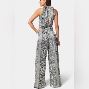 NWT SHOW STOPPER BEBE JUMPSUIT XS